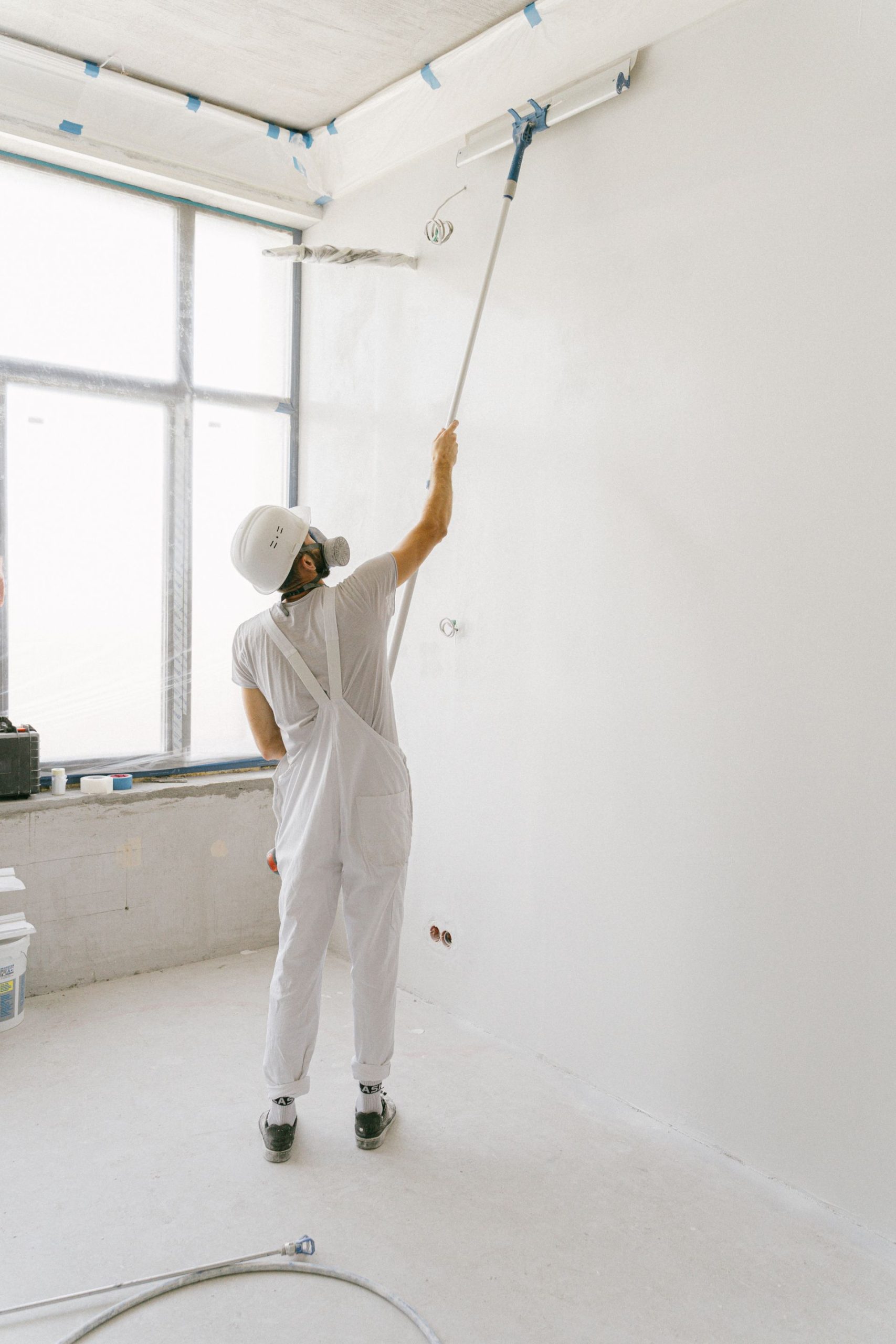 Professional painter updating a home interior